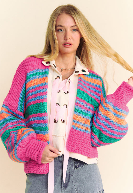 Chunky stripe balloon sleeve cardigan in pink with multicolor stripes and lace-up detail.