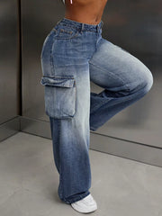Vintage wide-leg cargo jeans in light wash denim with ombre fading and utility pockets.
