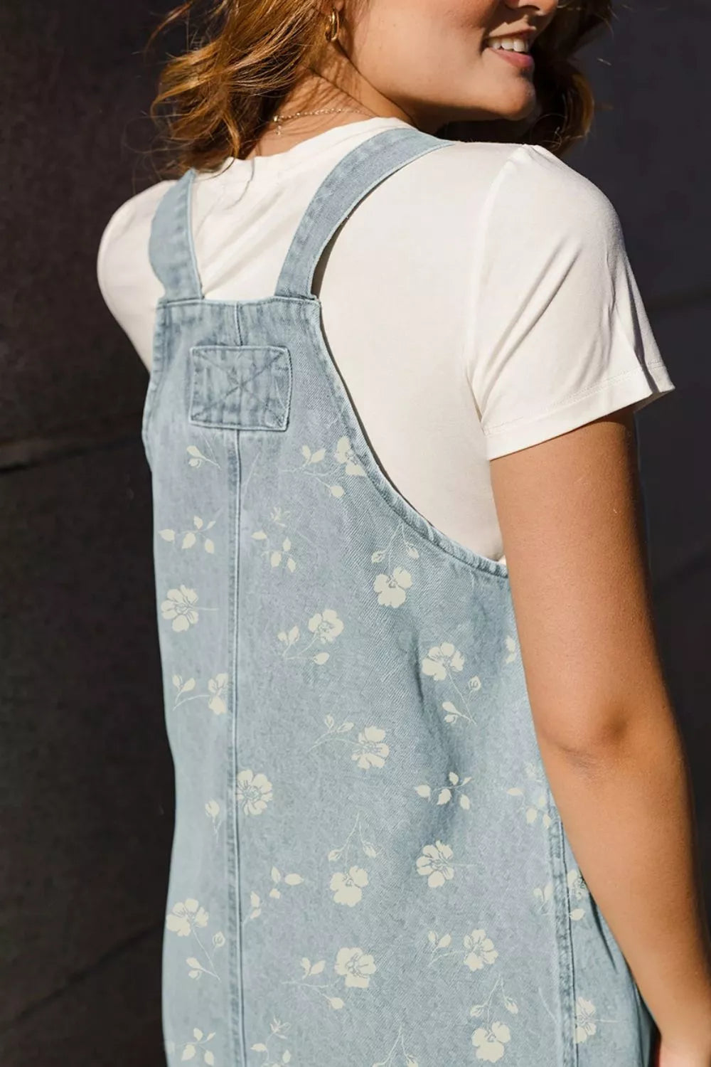 Wash Denim Floral Print Overall Mini Dress in Light Blue, close-up detail