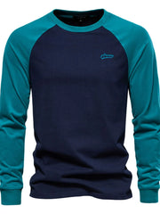 Navy and teal colorblock raglan tee with embroidered logo