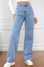Light blue denim wide-leg jeans with a sculpted waist and button fly.