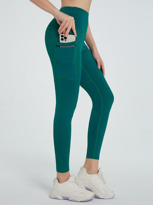 Dark Green Pocketed Sculpt Leggings with contrast stitching and side phone pocket.