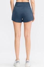 Sculpted high-waist active shorts in Dark Blue with a back pocket detail.