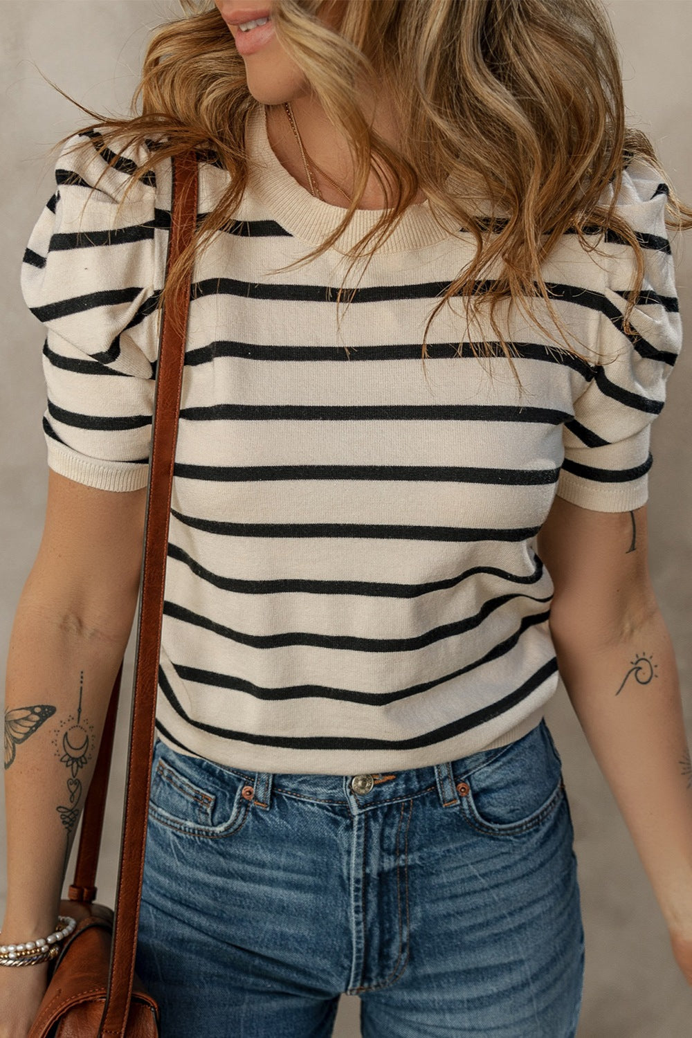 Puff sleeve breton knit top in cream with black stripes and crew neck.