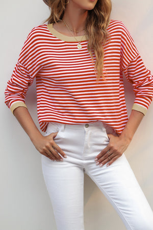Nautical knit crewneck sweater with red and white stripes and contrast tan trim at neckline and cuffs.