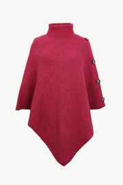 Hot Pink acrylic turtleneck knit poncho with button details on the shoulder.