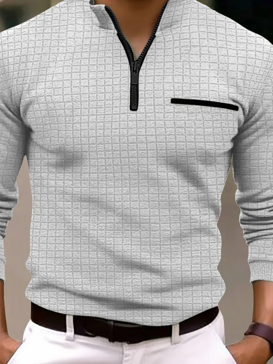 Gray textured zip-neck polo with black contrast pocket and zipper
