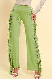 Yellow-green palazzo trousers with cascading fringe detail on the sides.
