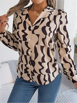 Tan abstract wave print silk-touch blouse with button front and collar.