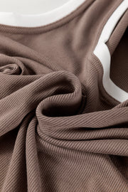 Mocha ribbed knit tank top with contrast white trim and scoop neckline.
