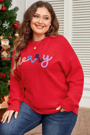 Red crewneck sweater with embroidered "Merry" text in multicolor yarn.