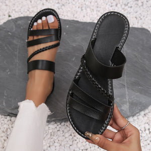 Black braided strap open-toe flat sandals with ankle strap detail