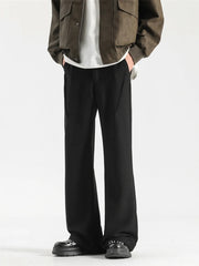 Black relaxed fit wide-leg sweatpants with elastic waist and pockets.