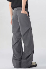 Gray men's wide-leg sweatpants with pockets and a relaxed fit.