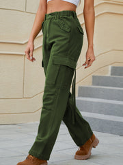 Army green utility pocket straight leg cargo pants with tie detail.