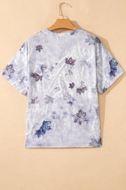 Tunic tee with crew neck and short sleeves in a faded purple and blue leaf print.