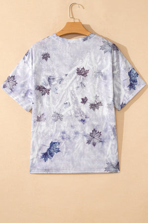 Tunic tee with crew neck and short sleeves in a faded purple and blue leaf print.