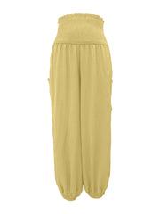 Yellow smocked waist harem pants with pockets and ankle cuffs