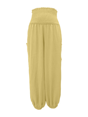 Yellow smocked waist harem pants with pockets and ankle cuffs