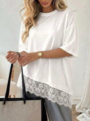 White tee with lace trim hem and half sleeves, asymmetrical cut.