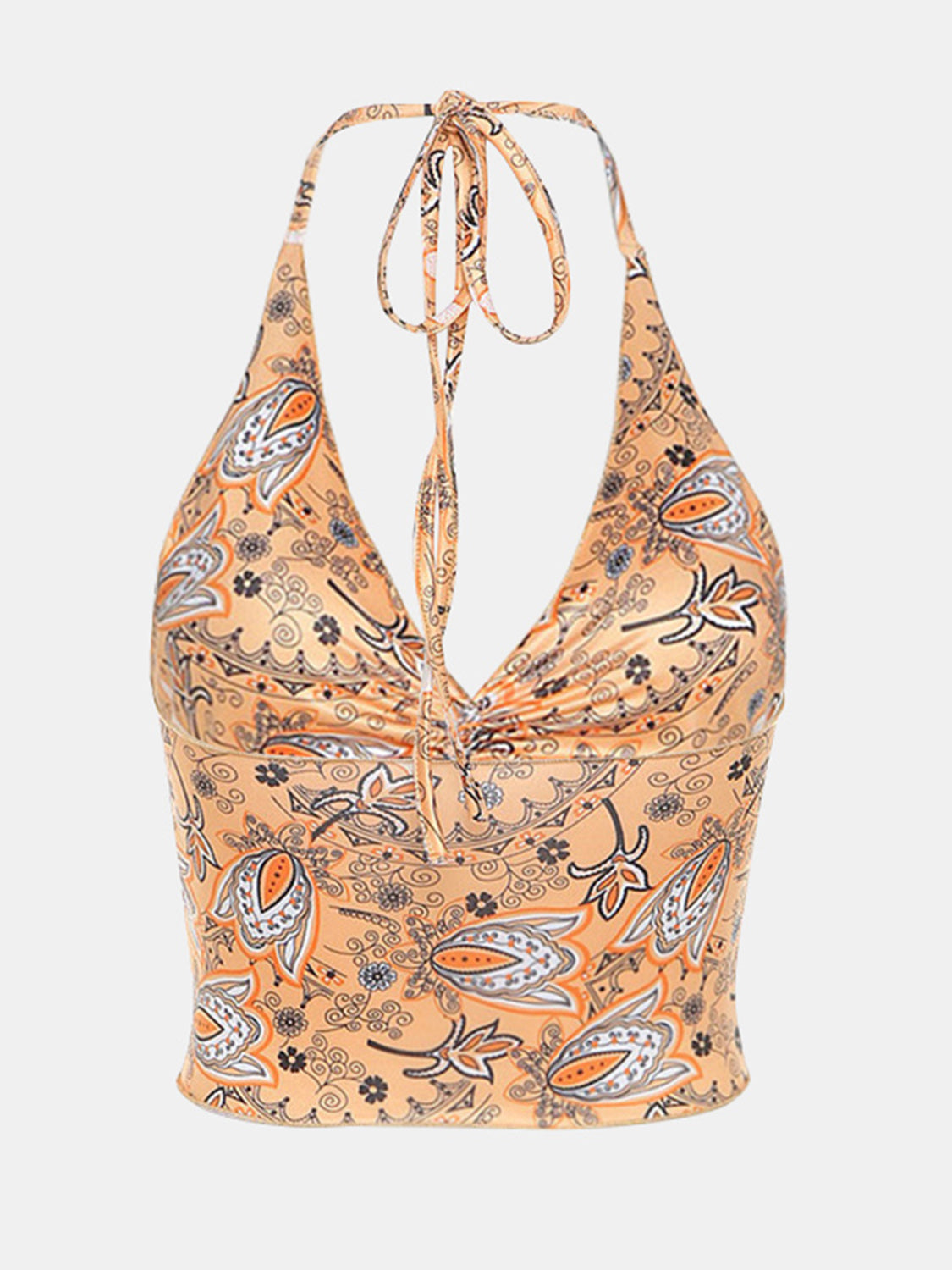 Paisley print halter top in tangerine with ruched detail and tie neck.