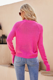 Hot Pink raglan sleeve button-up knit cardigan with ribbed cuffs and hem.