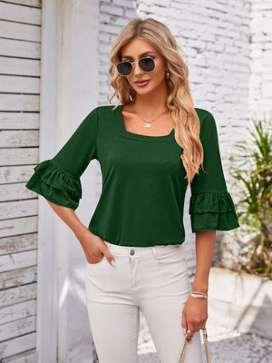 Dark green blouse with square neckline and ruffled bell sleeves.