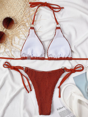 Textured wrap bikini set in rust with tie sides and ring details.