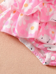 Pink ruffled baby bodysuit with white daisy print and bear faces, cotton.