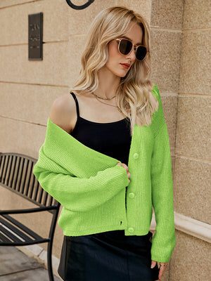 Textured yellow-green acrylic button-down knit cardigan with ribbed details.