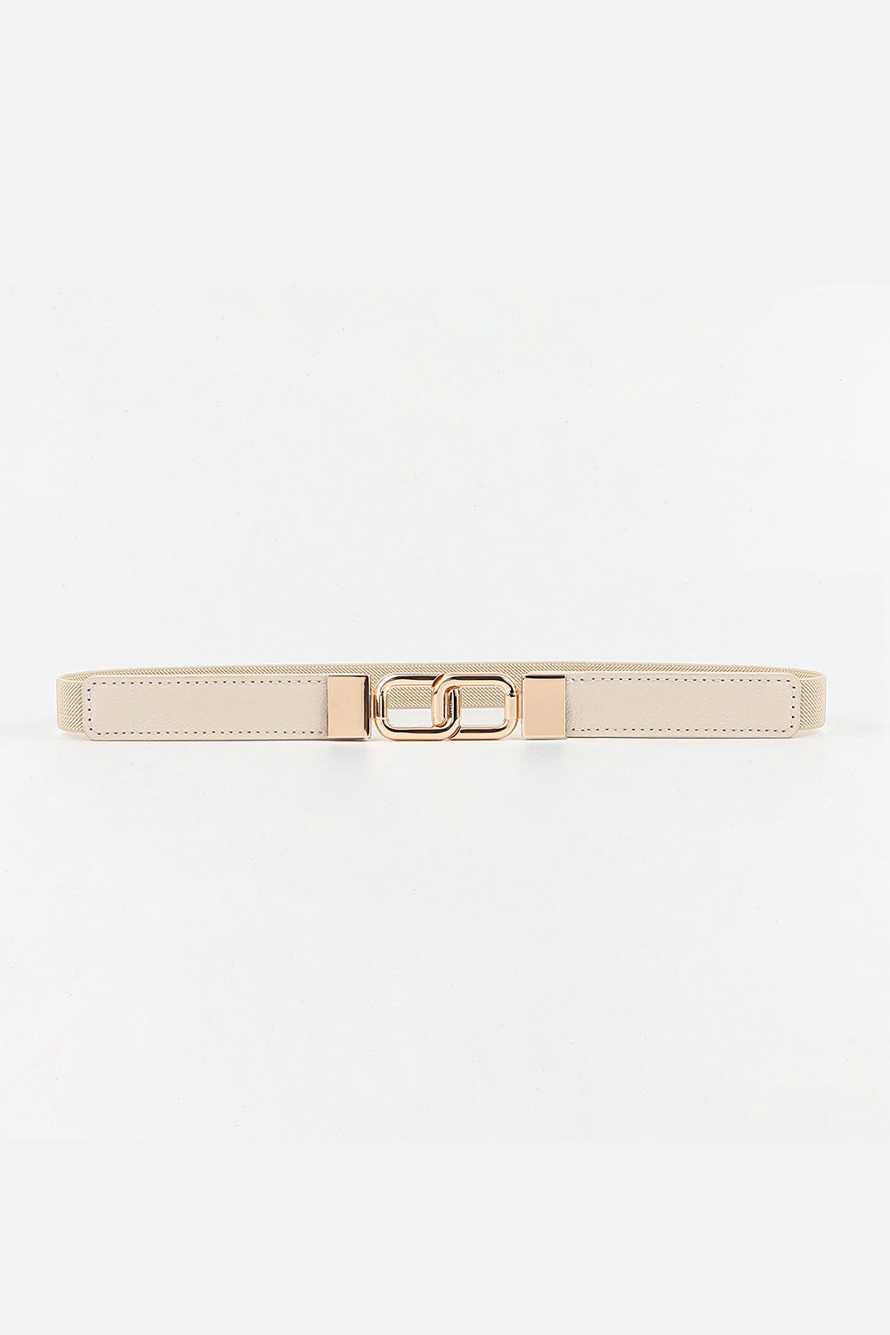 Cream elastic belt with linked rectangle gold buckle and gold end caps.