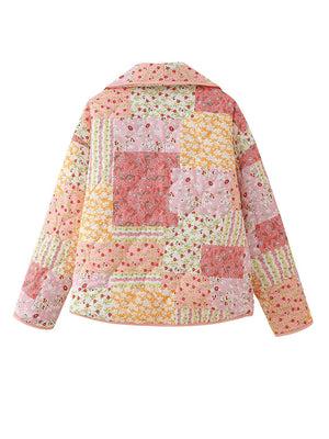 Floral quilted patchwork jacket in pink and orange hues with a collared neckline.