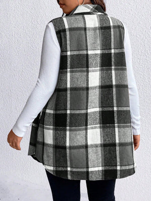 Oversized plaid shirt vest in black and white, featuring a collared neckline and buttoned front.