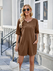 Mocha tee romper with short sleeves and dual front pockets.