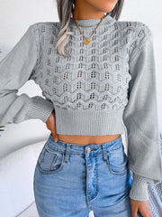 Light Gray openwork puff sleeve knit sweater with mock neck and ribbed hem.