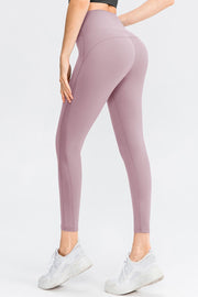 Lilac performance leggings with subtle side mesh panels and a high waist.