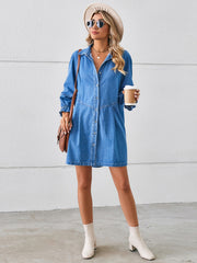 Denim shirtdress in dark blue with button front and ruffled cuff sleeves.