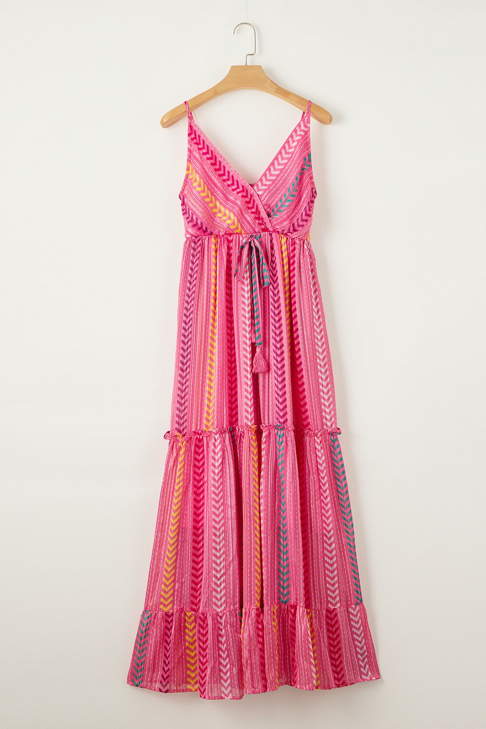 Pink chevron stripe tiered maxi dress with V-neck and tie waist.