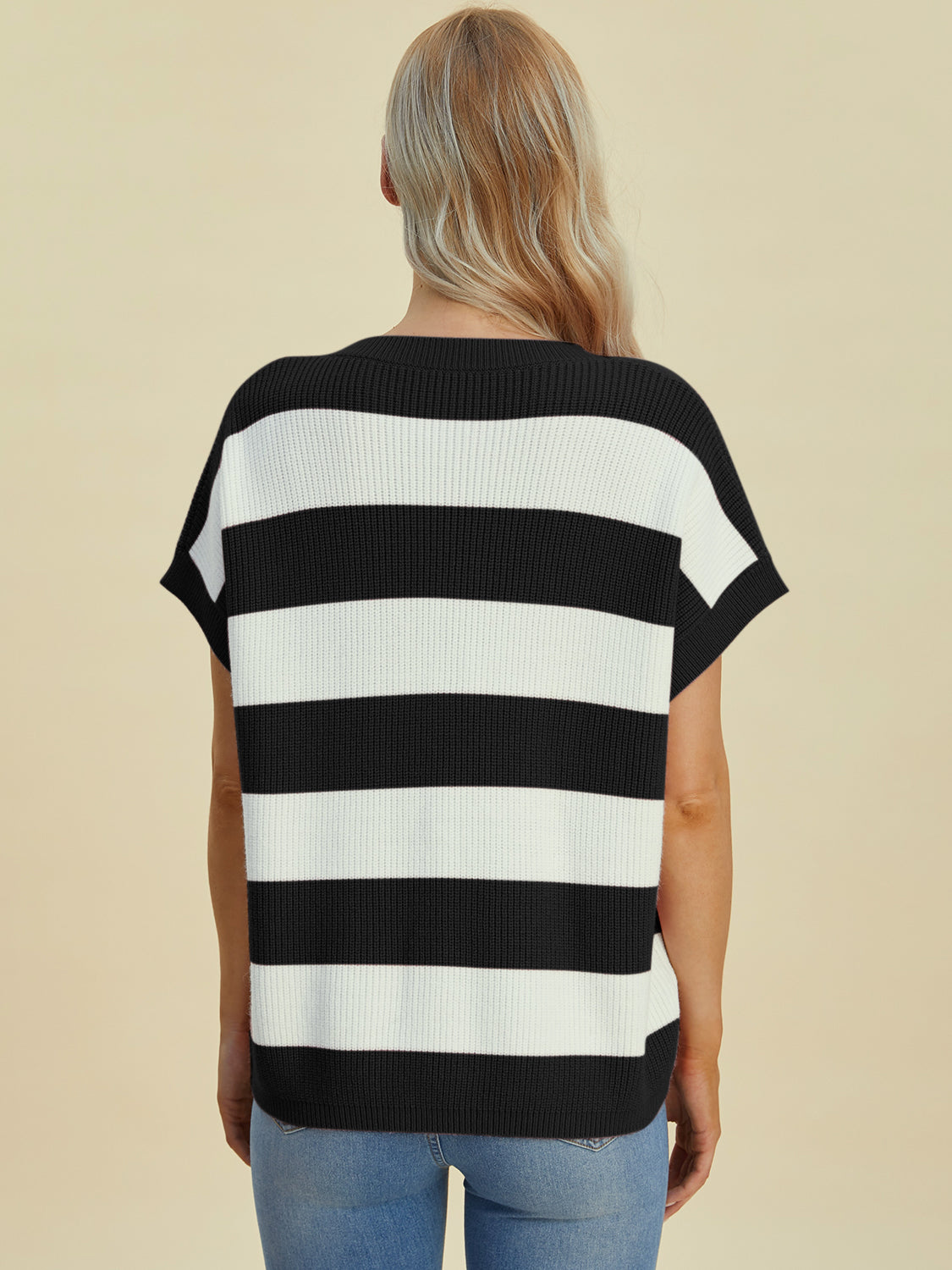 Black and white striped knit top with cap sleeves and a crew neck.