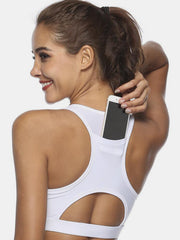 White racerback sports bra with pocket and cutout detail