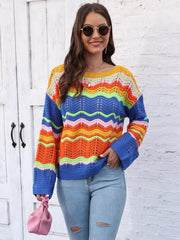 Crochet sweater with rainbow wave pattern, boat neck, and long sleeves.