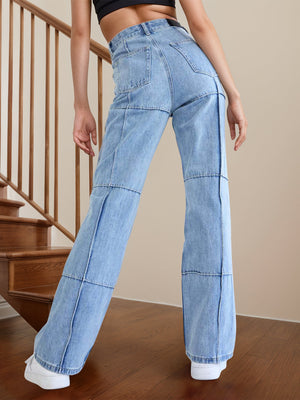 Light wash denim flare trousers with panel detailing and a casual fit.