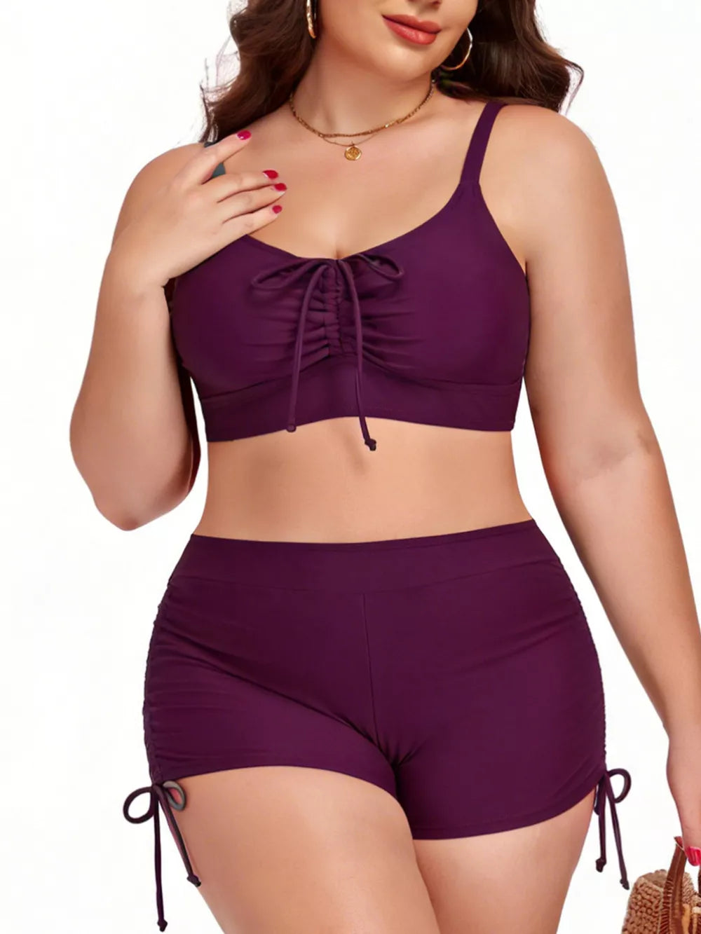 Plus size deep purple drawstring bikini set with ruched front top and adjustable side ties on shorts.