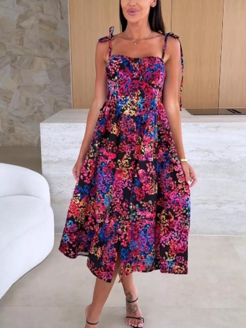 Floral tie-strap midi dress with a sweetheart neckline and A-line skirt.