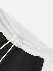 Black sweatpants with white drawstring and elastic waistband detail