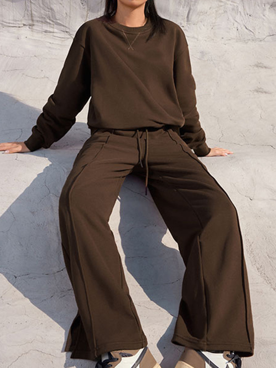 Brown seamed sweatshirt and wide-leg lounge pants set with drawstring waist.
