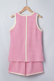 Textured stripe two-piece set with pink and cream vertical and horizontal stripes.