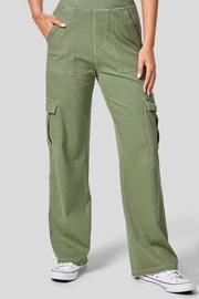 Utility denim wide-leg cargo pants in Matcha Green with front and side pockets.