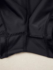 Black athletic jogger shorts with visible seams and ribbed waistband detail.