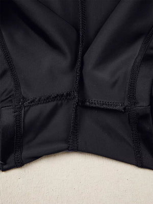 Black athletic jogger shorts with visible seams and ribbed waistband detail.
